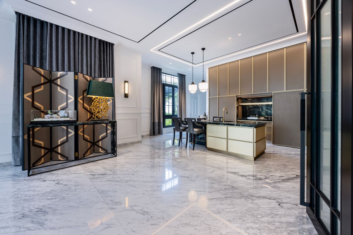 The spacious pantry features a stylish island breakfast counter