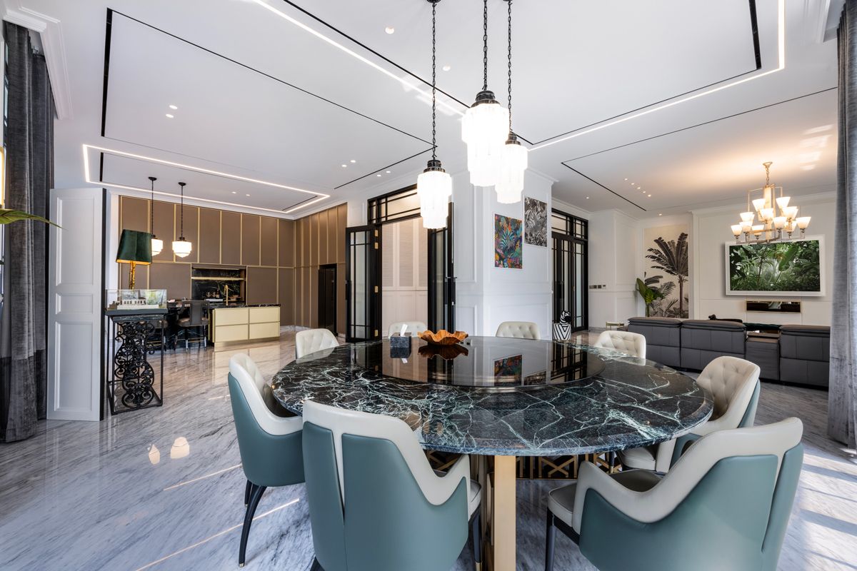 This dining room features a custom Verde Alpi marble dining table, designed by Zync Studio + Workshop