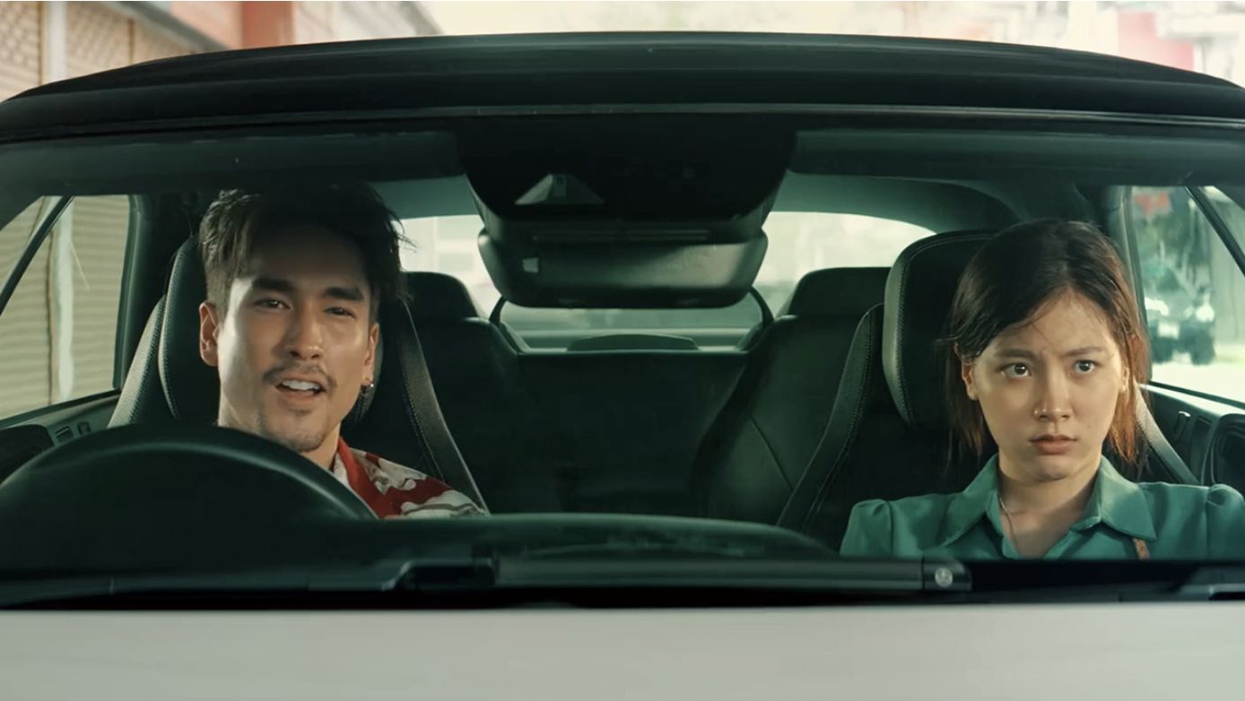 Nadech Kugimiya (as Tower) and Baifern (as Ina) in ‘The Con-Heartist’ on Netflix