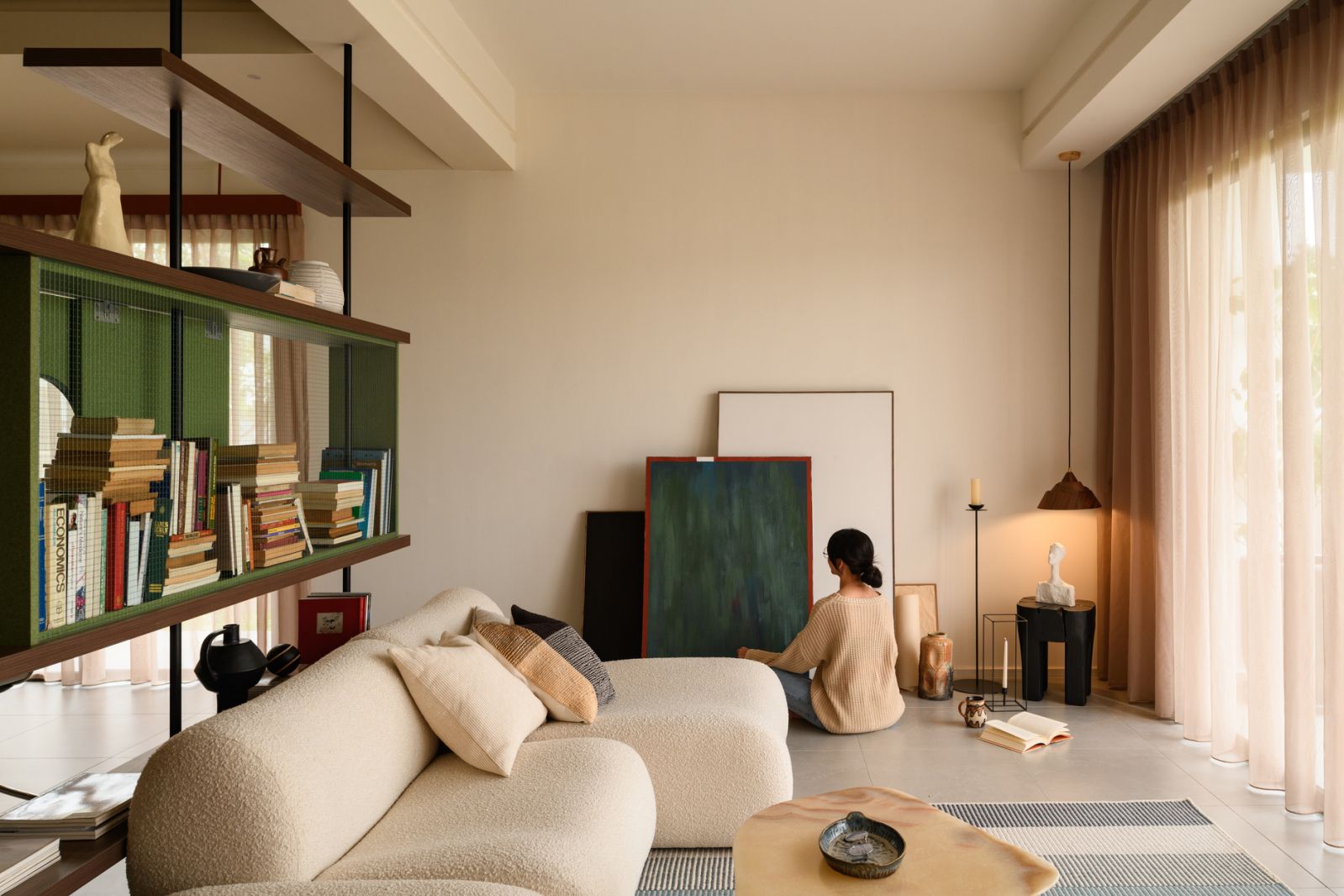 The serene living room showcases the quirky modern aesthetic where function meets artistic expression