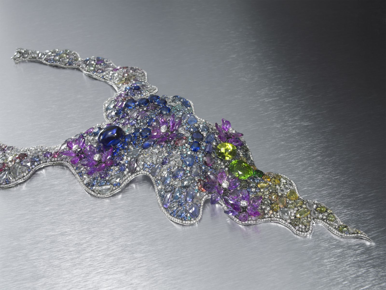 precious gems encrust a platinum necklace