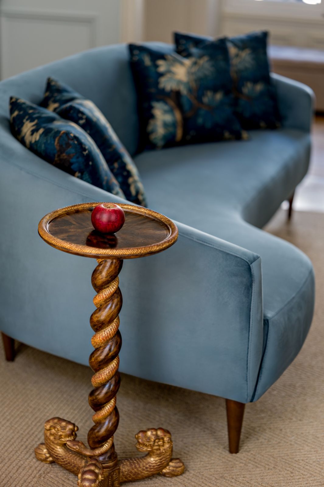 The Venetian snake-design table and marble apple