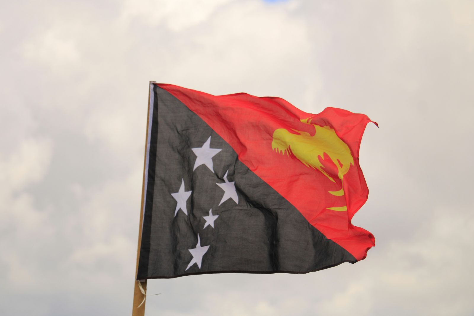 The flag of Papua New Guinea (Photo: Spencer Wungin via Unsplash)