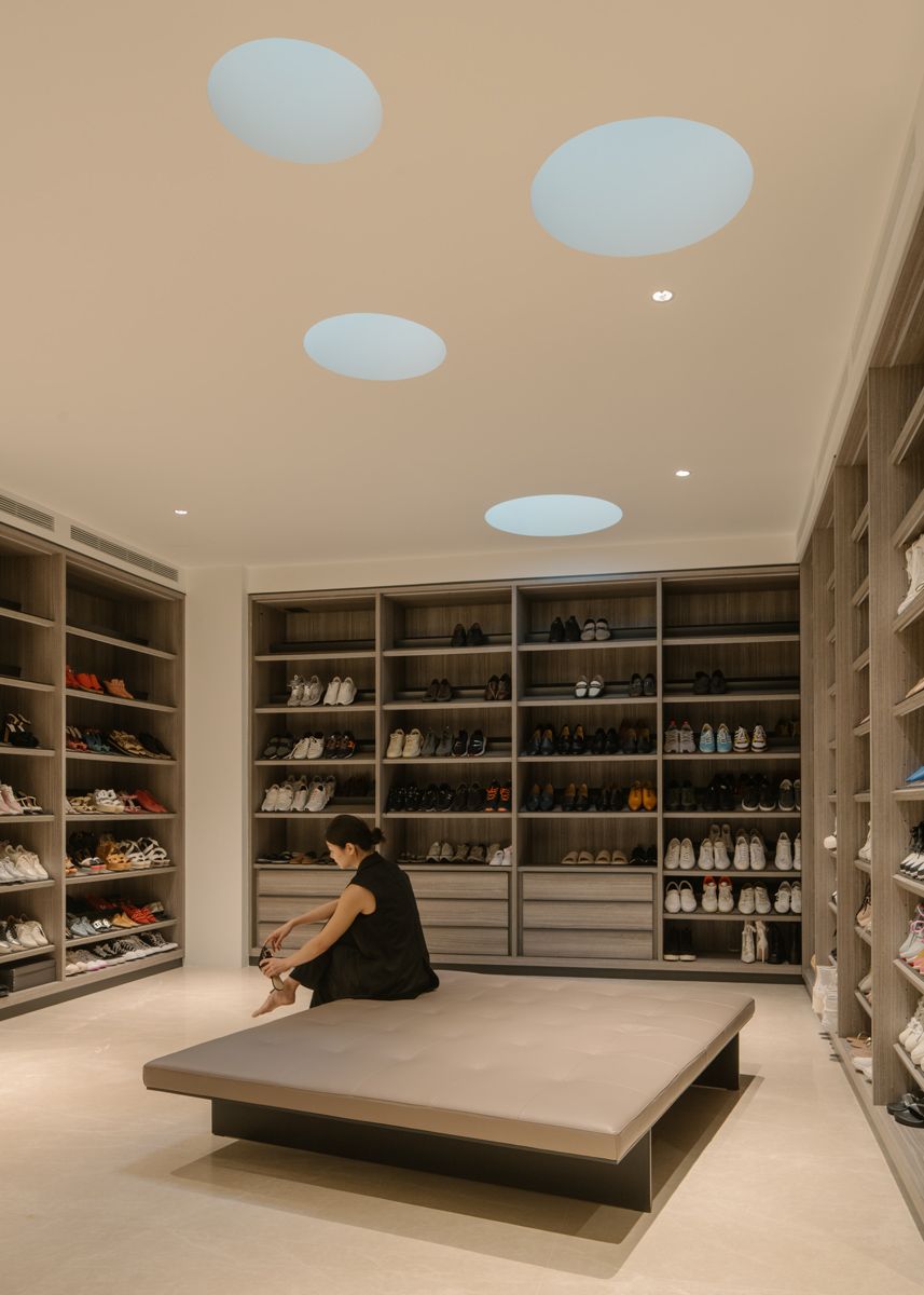 The basement’s spacious shoe room is where one stops by before entering and leaving the home