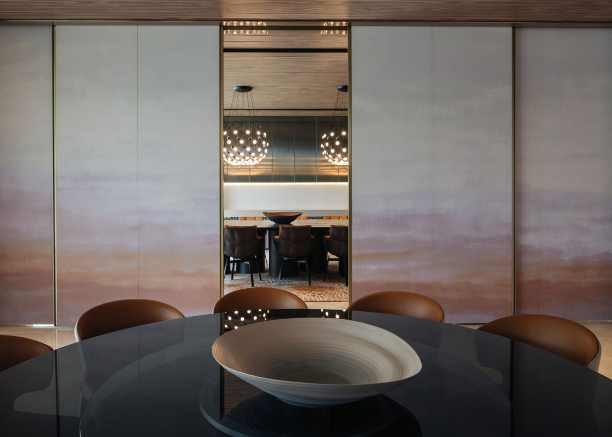 This artwork can be slid open to merge the room with the adjacent dining room