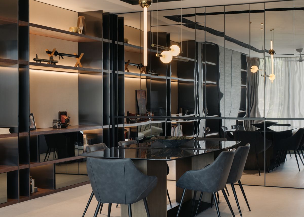The junior master dining room features reflective panels that double the visual perception of the space