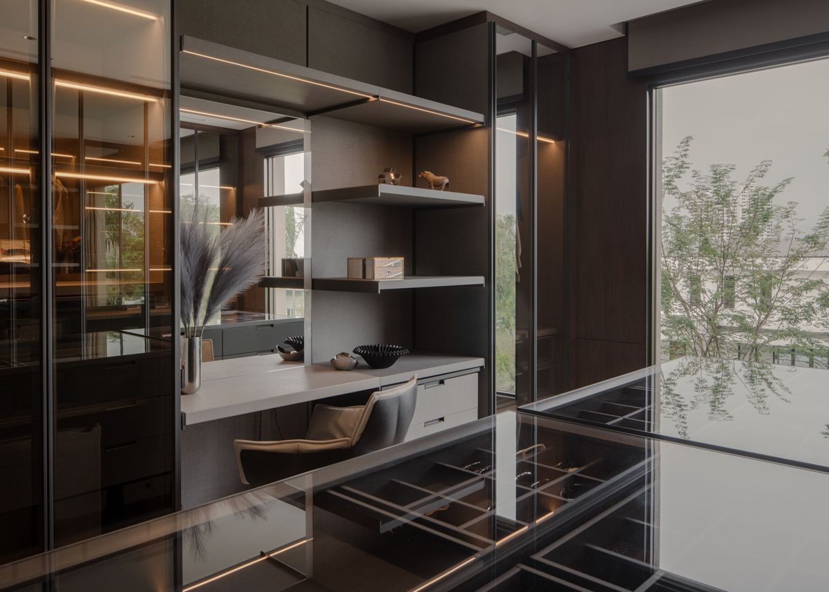 The adjacent junior master wardrobe is akin to an upscale fashion house