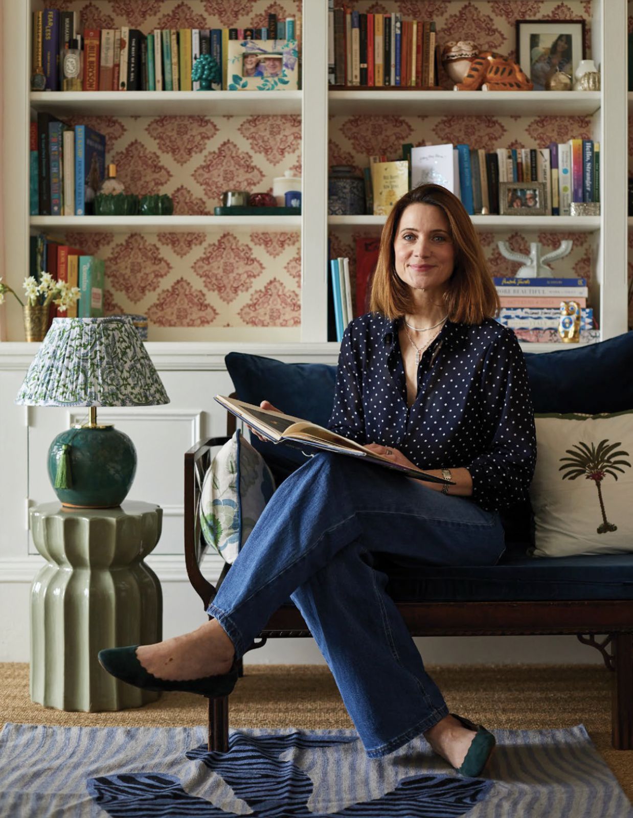 Kate Sbuttoni in her living room