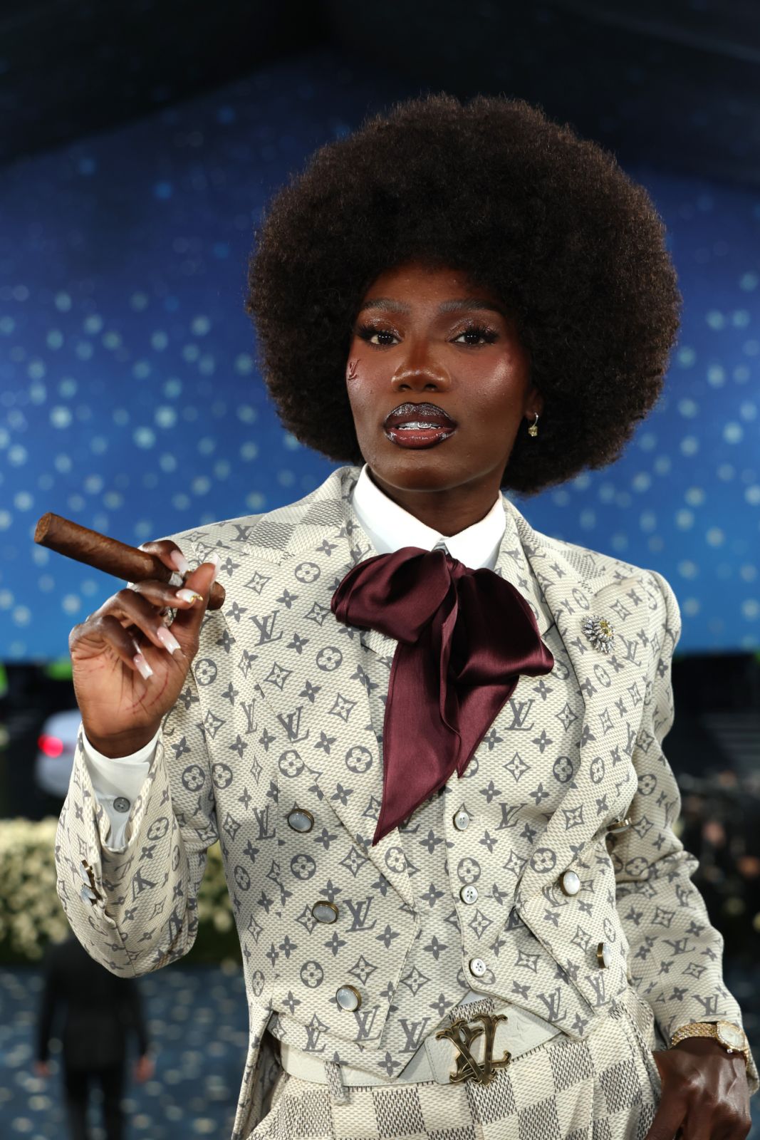 Doechii attends the 2025 Met Gala Celebrating "Superfine: Tailoring Black Style" in Louis Vuitton (Photo: Getty Images)