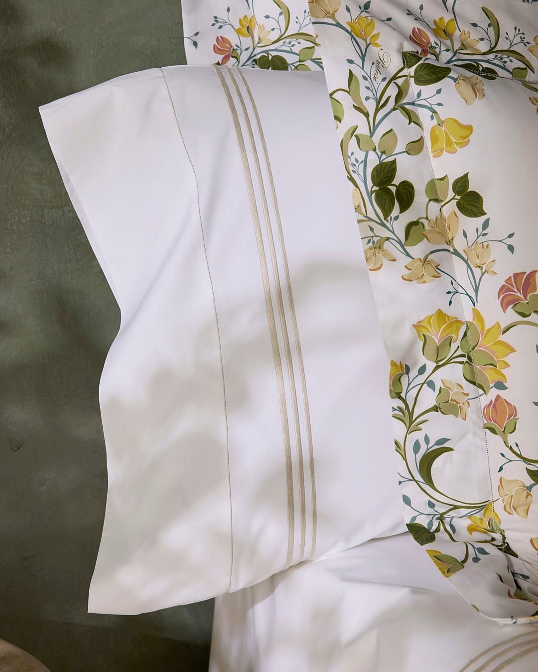 The Tre Righe hand-embroidery set against Egyptian cotton percale (Photo: Instagram / @pratesi.official)