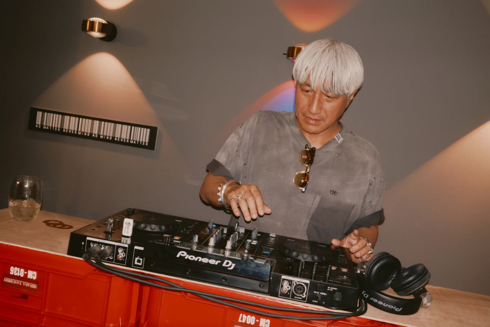 Mihara Yasuhiro takes on the DJ booth at the launch of his pop-up at Studio Dimensione (Photo: courtesy of Bench)
