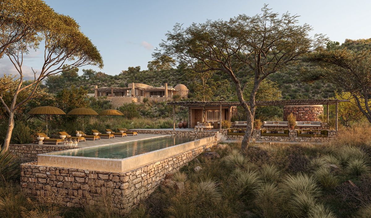 The guest area exterior of andBeyond Suyian Lodge in Kenya blends into the semi-arid landscape with a design inspired by the region’s kopjes—setting a new benchmark for eco-conscious hospitality in the Global South