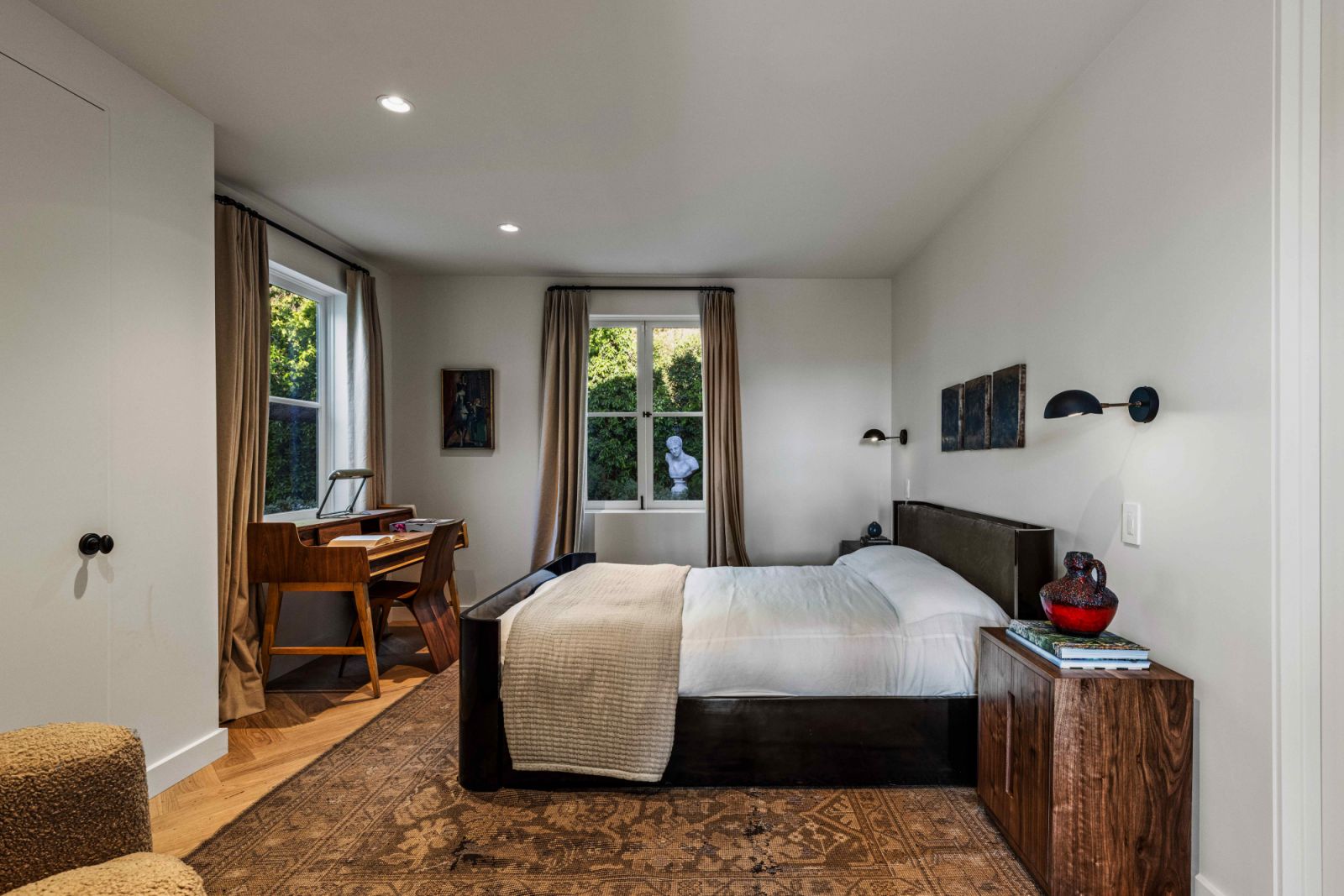 The guest bedroom with a Ralph Lauren bed in pewter velvet