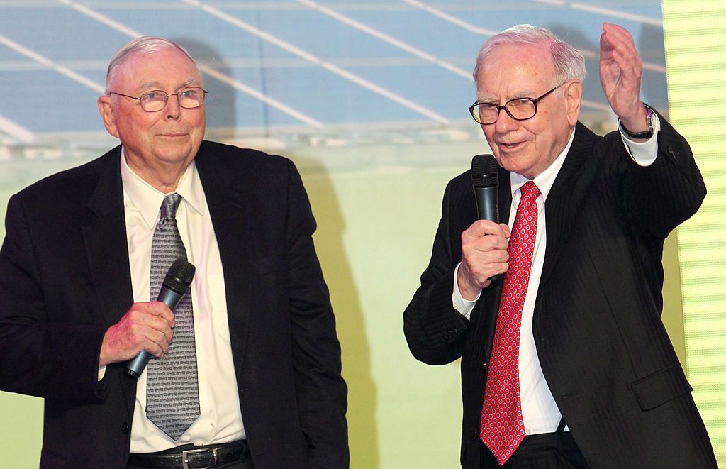 BEIJING - SEPTEMBER 29: (CHINA OUT) Berkshire Hathaway Vice-Chairman Charles Thomas Munger (L) and Berkshire Hathaway CEO Warren E. Buffett attend a BYD Co Ltd new product launch conference at China World Hotel on September 29, 2010 in Beijing, China. BYD, an electric car and battery maker, recently received a boost when Buffet delievered favorable remarks about the company during an event hosted by BYD. (Photo by Visual China Group via Getty Images)