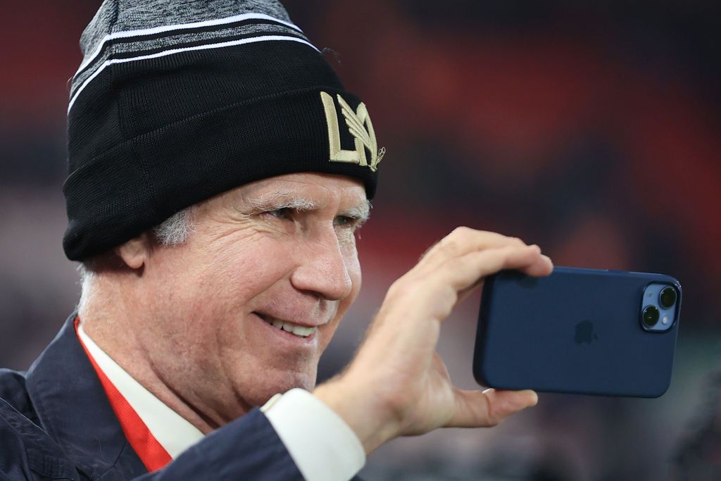 LIVERPOOL, ENGLAND - FEBRUARY 13: LAFC owner Will Ferrell films on his mobile phone during the Premier League match between Liverpool FC and Everton FC at Anfield on February 13, 2023 in Liverpool, United Kingdom. (Photo by Simon Stacpoole/Offside/Offside via Getty Images)
