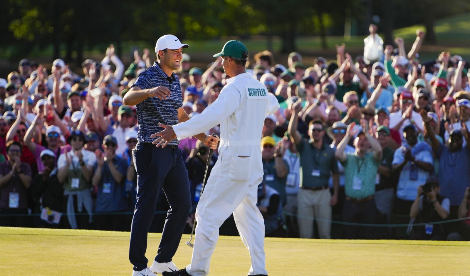 Rolex Testimonee Scottie Scheffler celebrates winning the 2022 Masters Tournament at the Augusta National Golf Club
