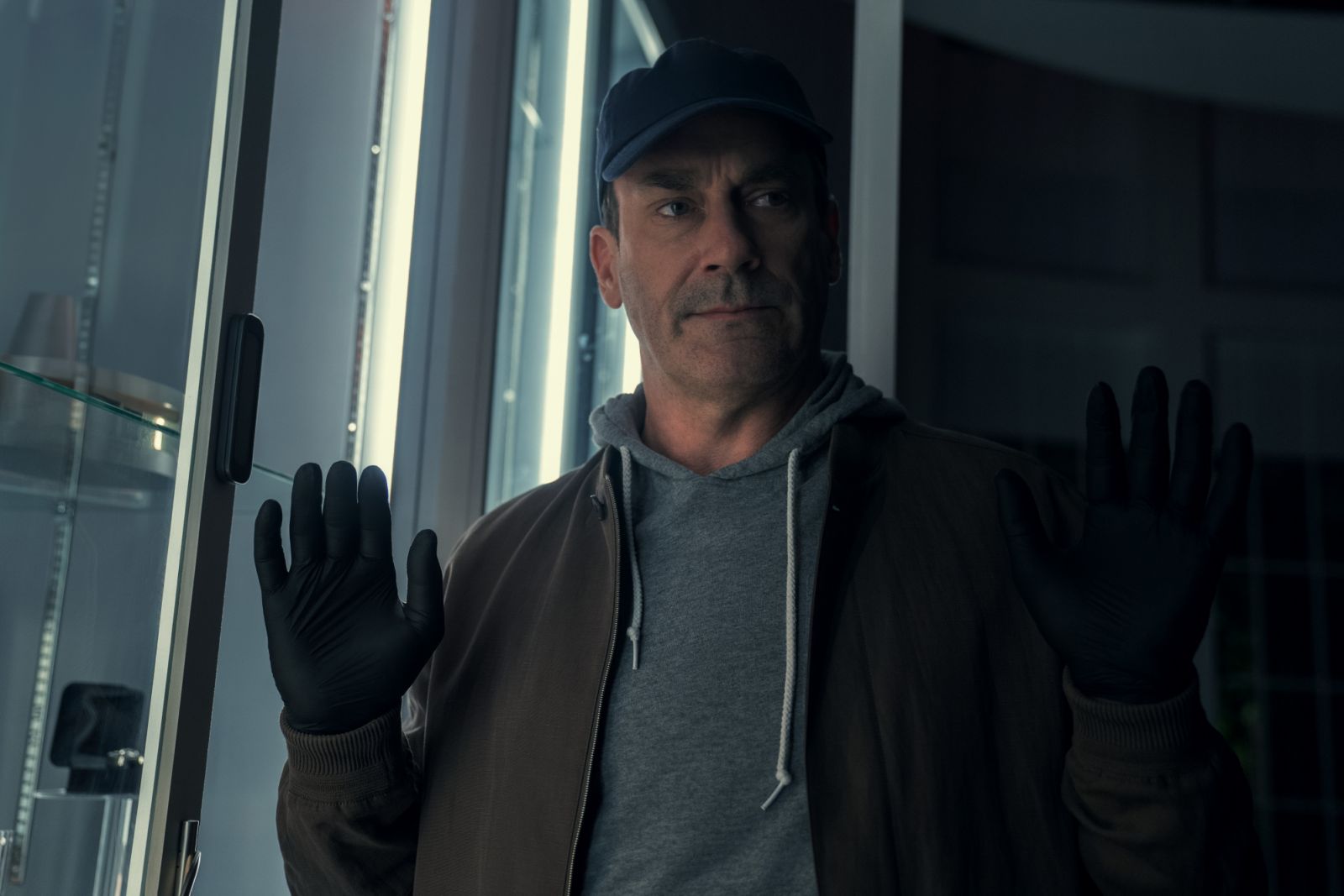 Jon Hamm plays Andrew Cooper, a billionaire robber, in "Your Friends & Neighbors" (Photo: Apple)