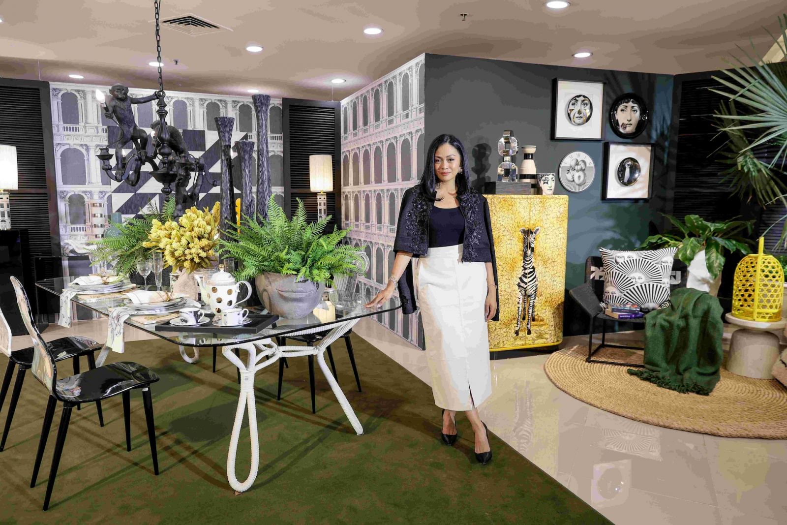 Idr. Cyndi Beltran, pictured with her vignette for Rustan's Designer's Circle 2025, is the creative director of Moss Manila, a design firm specializing in event builds, staging, and interiors. Her company, known for meticulous detail, has orchestrated over 300 events for high-profile clients like Tom Ford, Netflix, and Uniqlo, demonstrating a strong track record in designing and executing impactful projects.