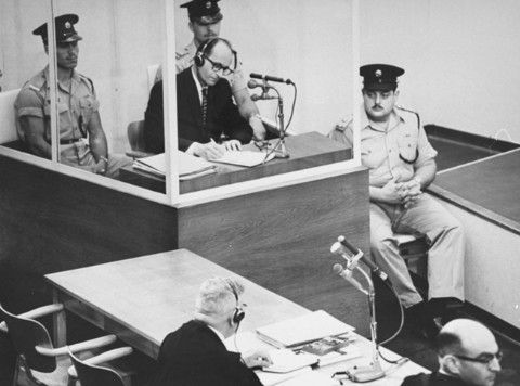 Adolf Eichmann in the glass booth during the Eichmann trial in 1961 (Photo: WikiCommons)