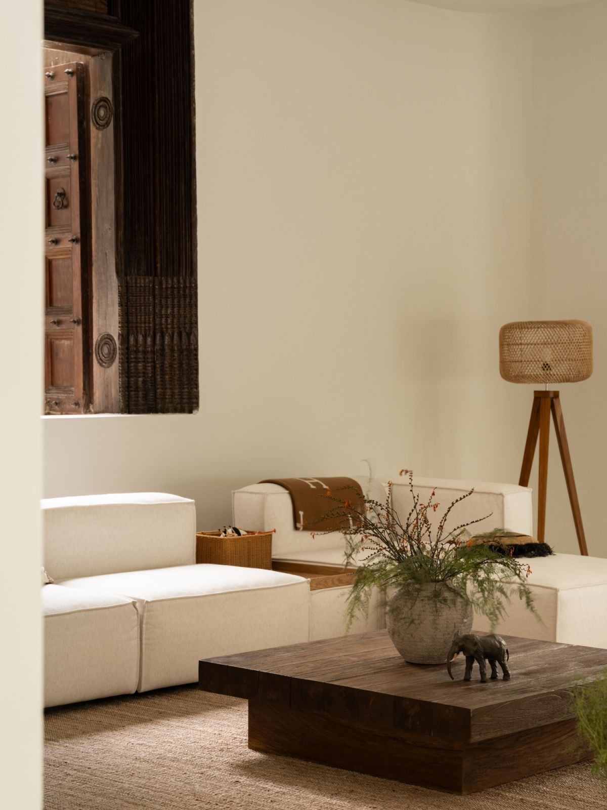 The neutral colour palette is applied mindfully throughout the living room
