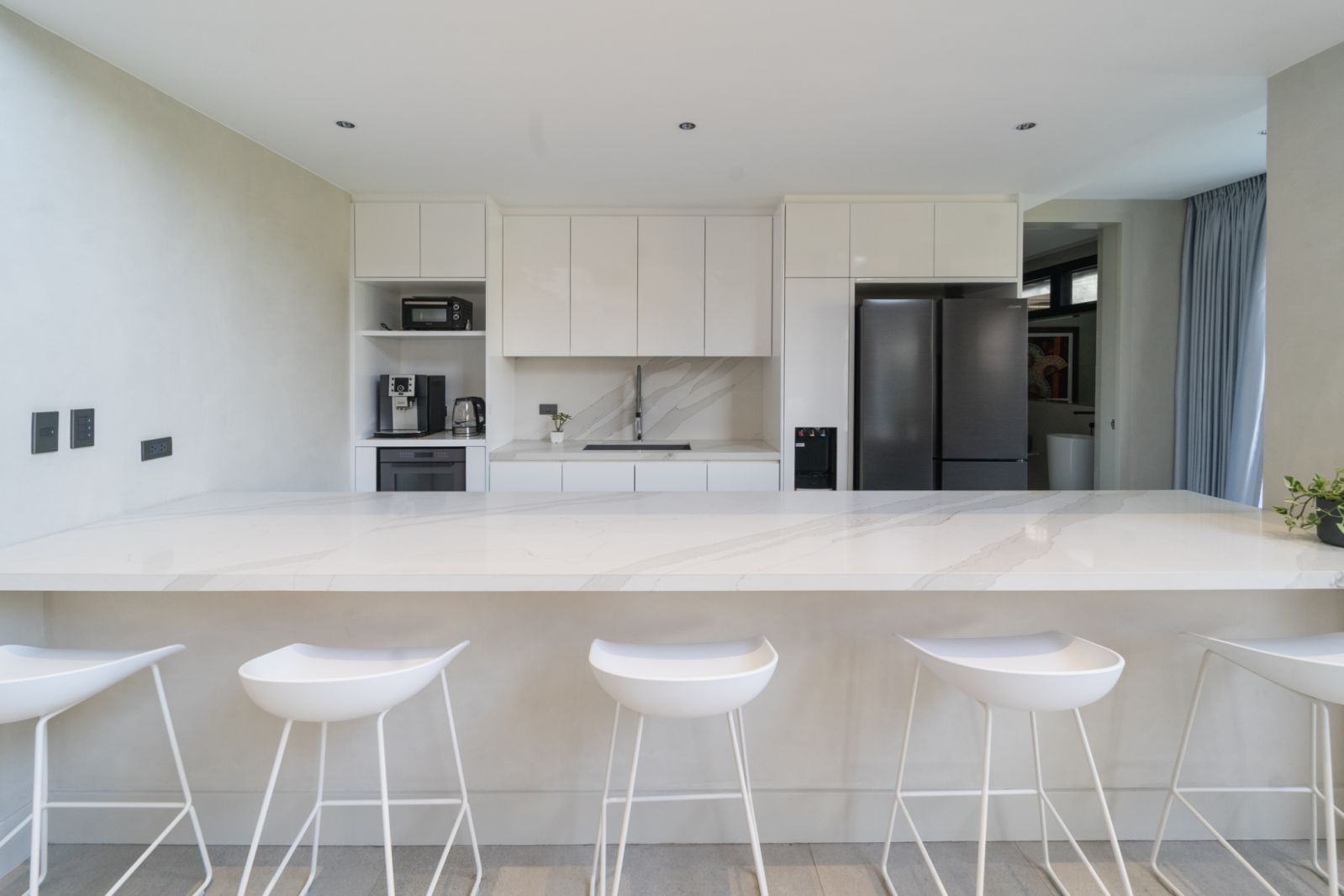 The minimalist colour palette of a family home in Malabon, Manila
