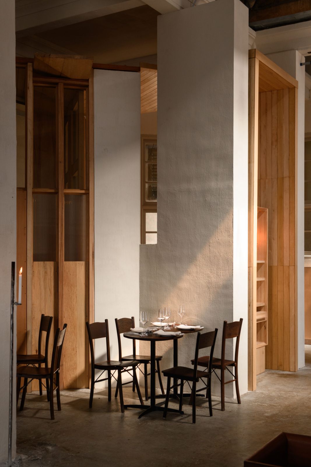 Custom sliding doors honor architectural heritage while providing modern climate control