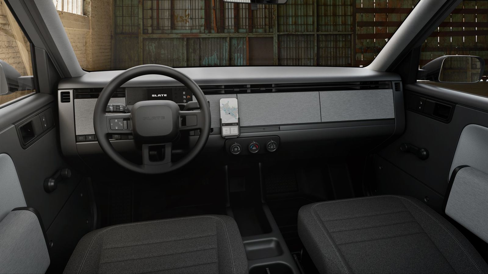 The Slate's dash uses a modular system so users can mount either a smartphone or tablet that doubles as the infotaiment system (Photo: Slate Auto)