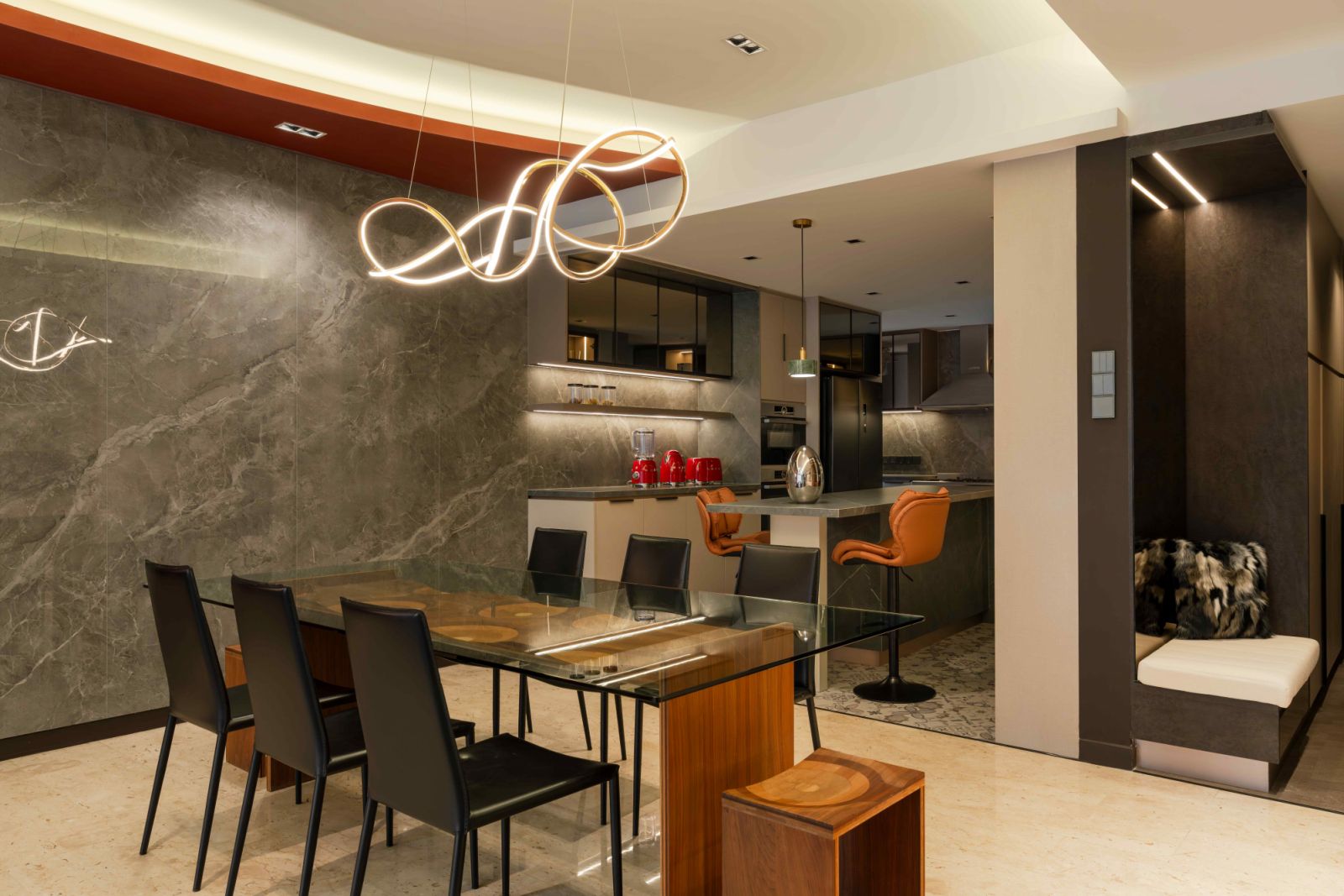 The dining area with a grey-toned marble wall