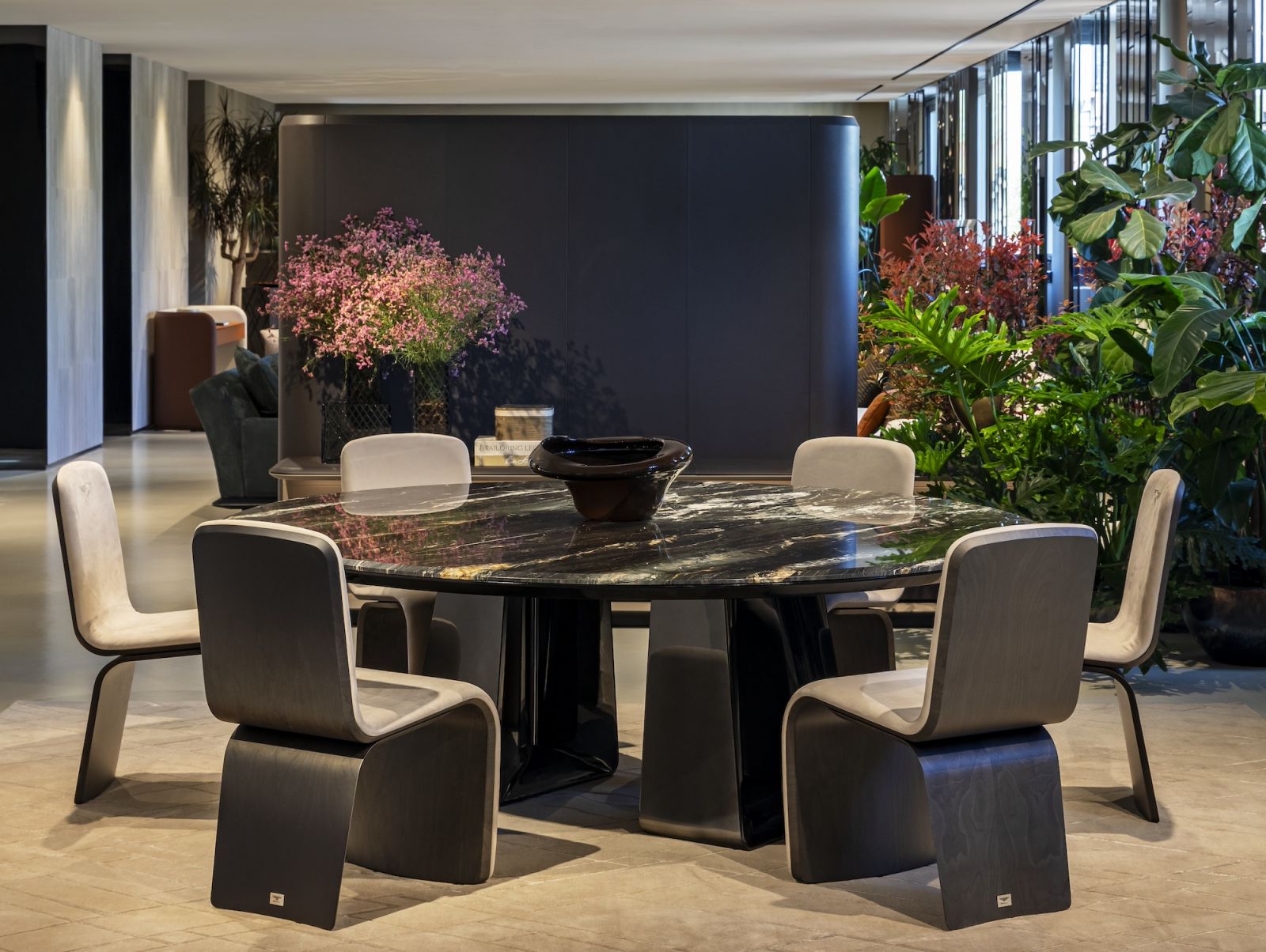 Francesco Forcellini, a long-standing Bentley Home design collaborator, has created a new, aerodynamic dining table called the Fenton Table with a double-layered top (Photo: Bentley)