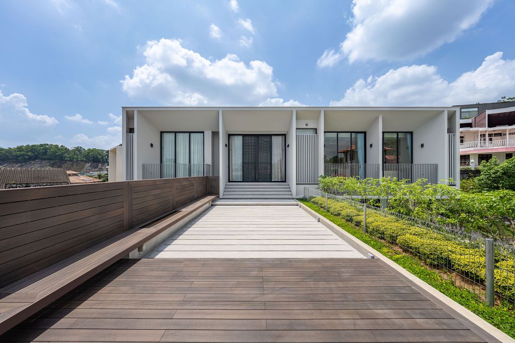 The timber-decked roof terrace provides an outdoor entertaining space on the upper level
