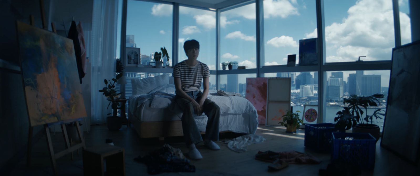 BTS member Jin at an apartment in Marina Bay Sands Singapore for the music video of 'Don't Say You Love Me'