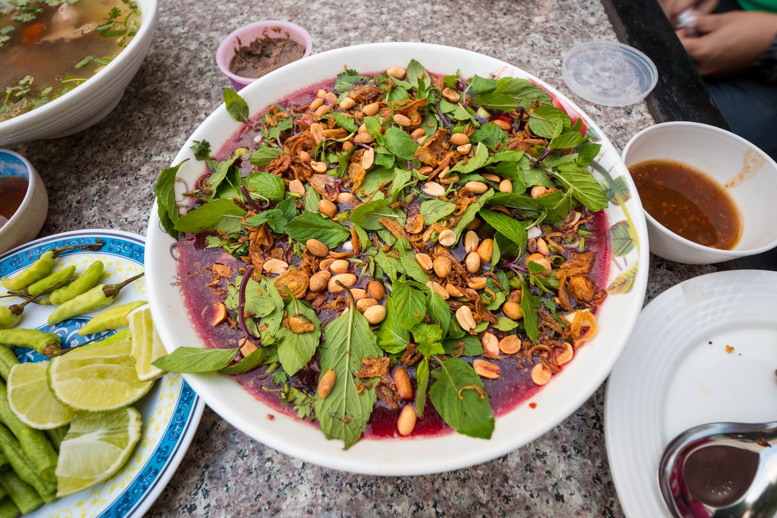 This duck blood 'salad' is made with fresh duck blood, and topped with herbs (Image: Migrationology)