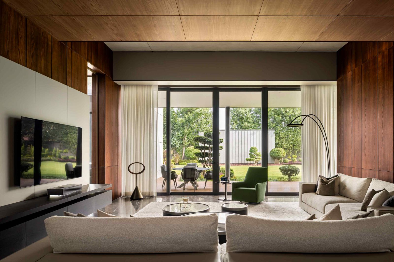 The multigenerational home embraces openness with deep connections to its natural surroundings