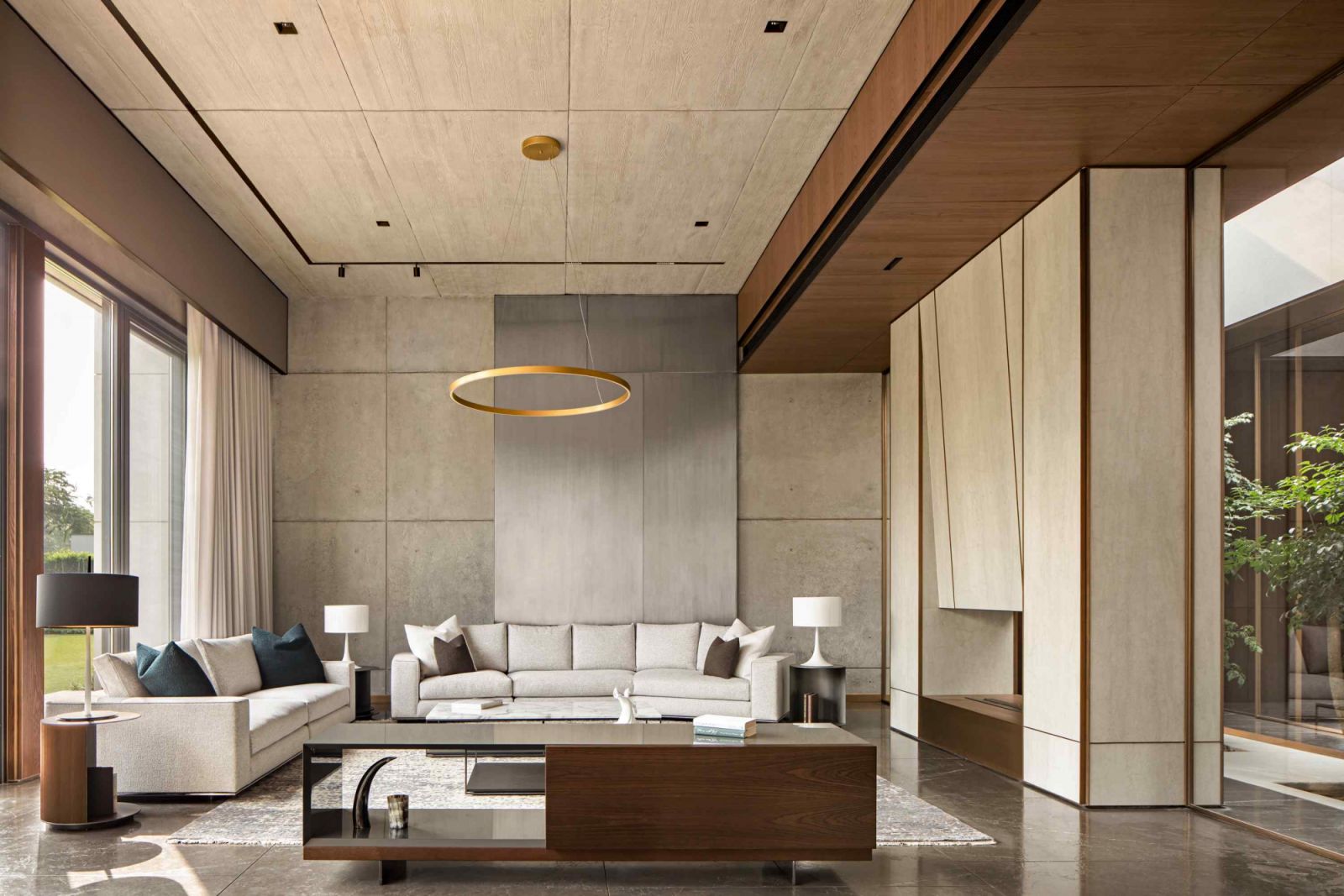 The neutral palette echoes the home’s connection to nature, while promoting a calm, timeless elegance