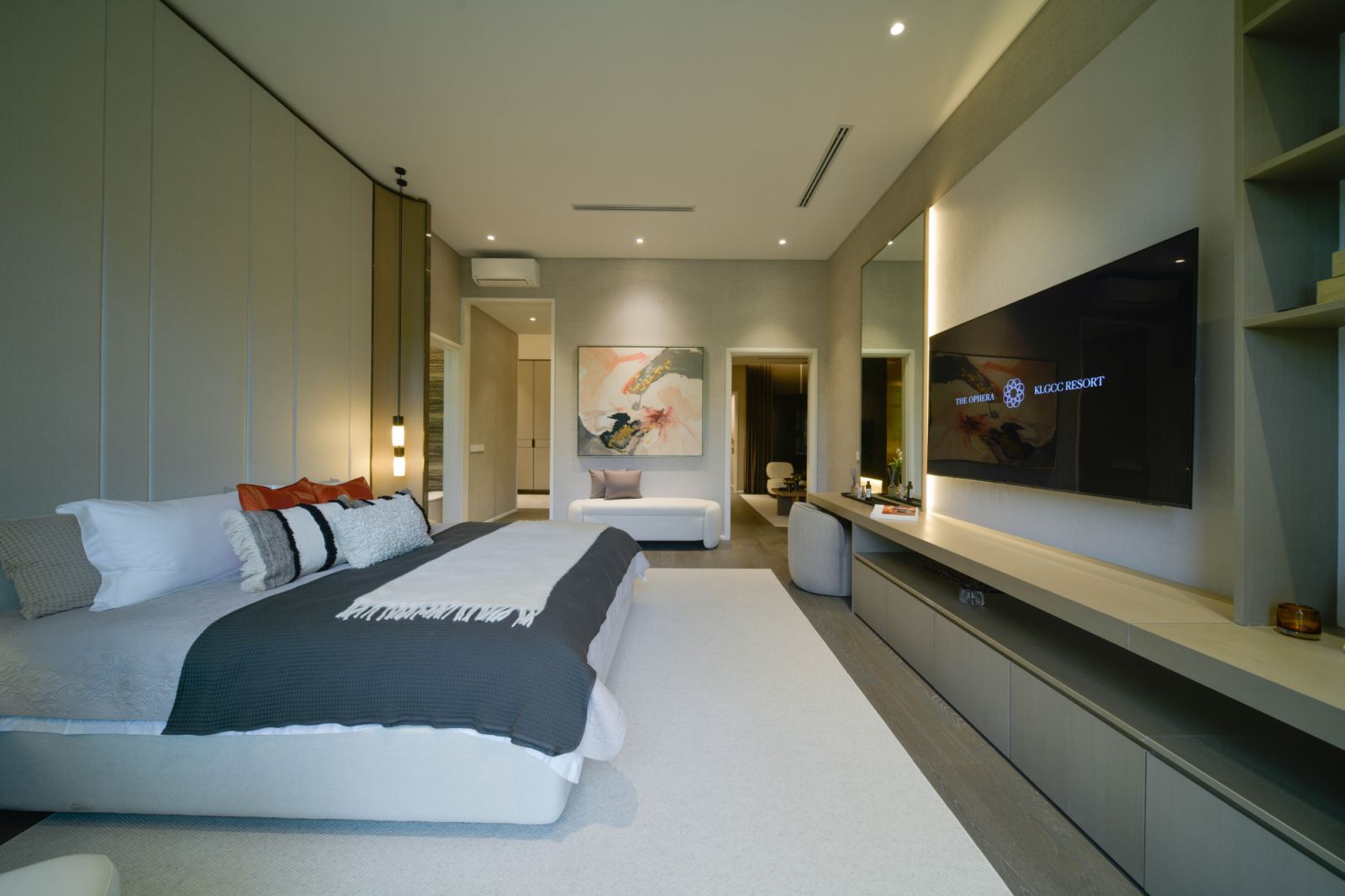 The master bedroom features layered lighting and soft textures that enhance the sense of privacy and comfort.