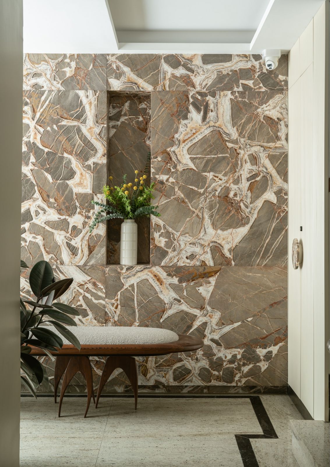 Exploring the exquisite marble details at the entryway of a home in Bengaluru, India, designed by Studio GSA