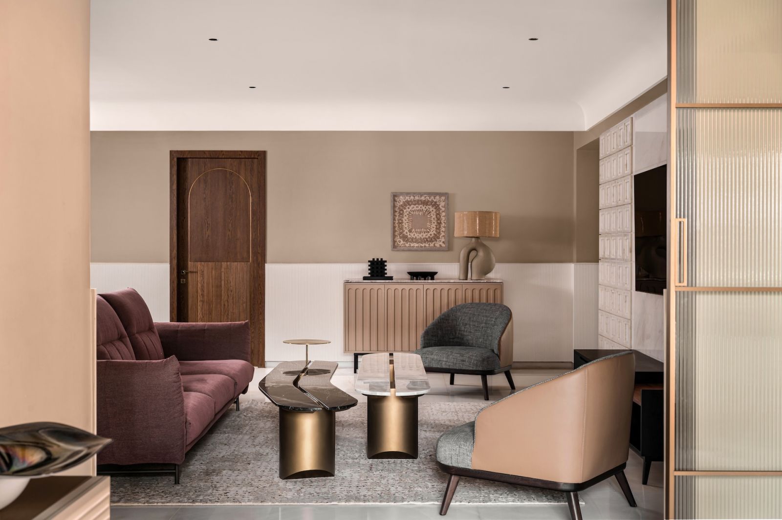 An interplay of marble and jewel tones in the living room of a home in Bengaluru, India, designed by Studio GSA
