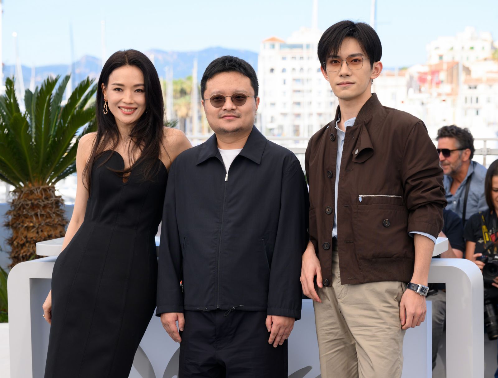 CANNES, FRANCE - MAY 23: (L-R) Shu Qi, Gan Bi and Jackson Yee pose during the "Resurrection" photocall at the 78th annual Cannes Film Festival at Palais des Festivals on May 23, 2025 in Cannes, France. (Photo by Karwai Tang/WireImage)