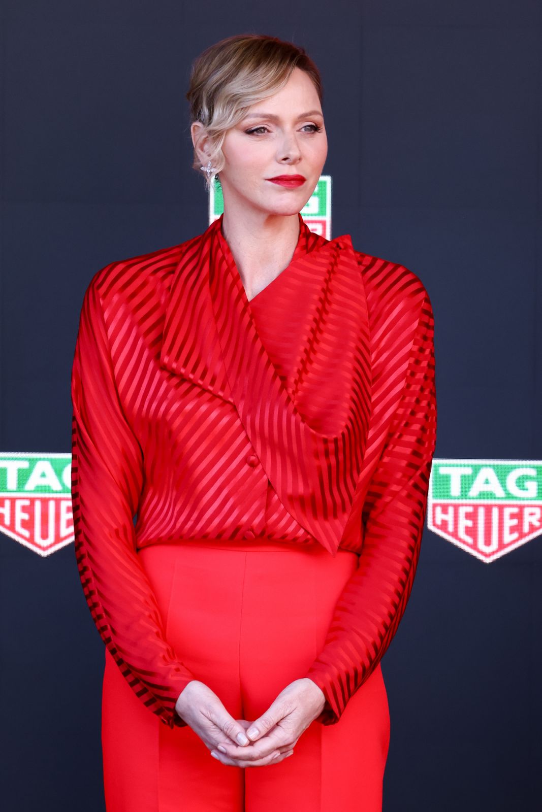 Princess Charlene of Monaco attends the F1 Grand Prix Of Monaco wearing a red custom Louis Vuitton top (Photo: Marc Piasecki/WireImage via Getty Images)