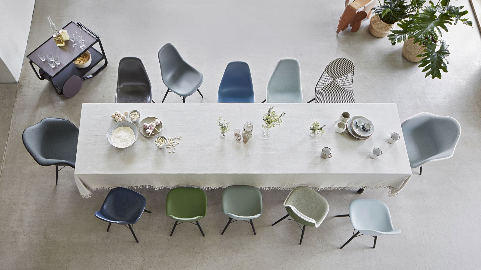 An aerial view reveals the comprehensive colour palette of the Eames DSW collection, showcasing both the original fibreglass shells and newer polypropylene versions (Photo: Vitra)