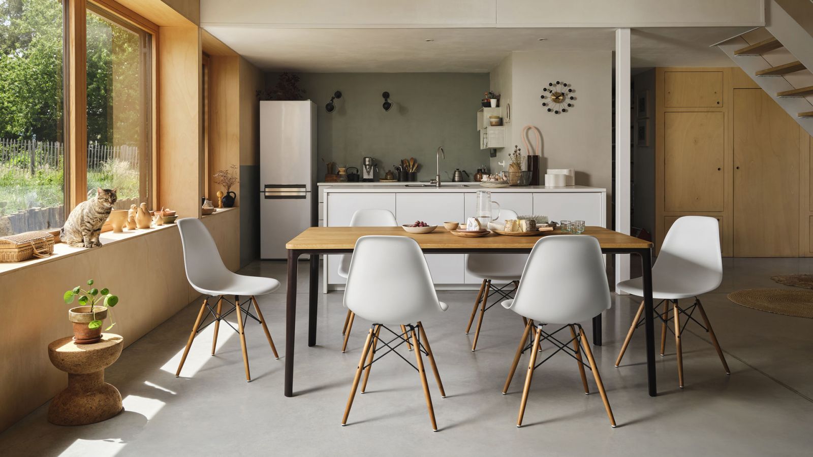 Classic white DSW chairs which resulted from Charles and Ray Eames’ extensive research into mass production techniques and human comfort (Photo: Vitra)