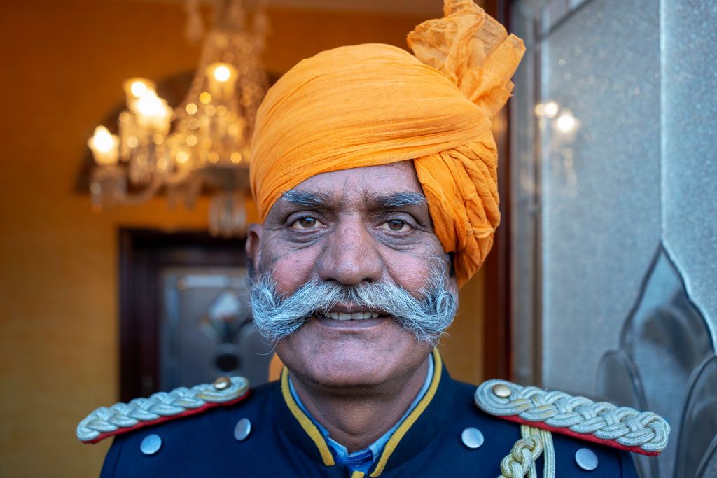 Bellman at the Umaid Bhawan Palace Hotel, a historic hotel in Jodhpur, Rajasthan, India, that is also the residence of the former royal family of Jodhpur. (Photo: Sergi Reboredo/VW Pics/Universal Images Group via Getty Images)