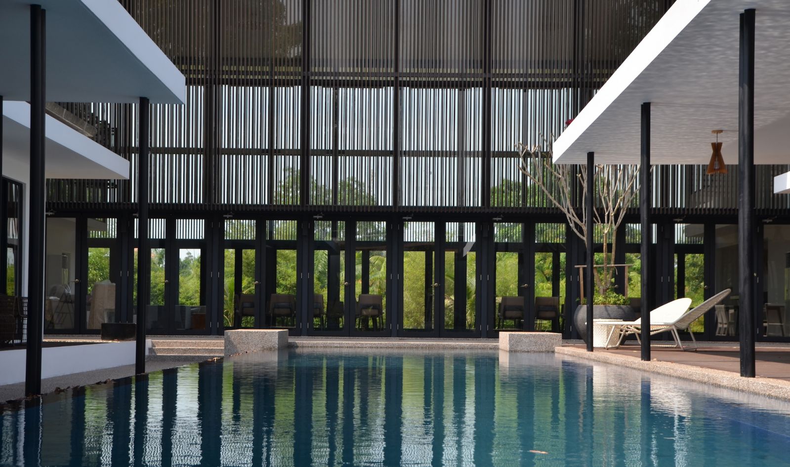 Double-height spaces are impressive while delivering practical benefits of enhanced light, air circulation, and spatial flows