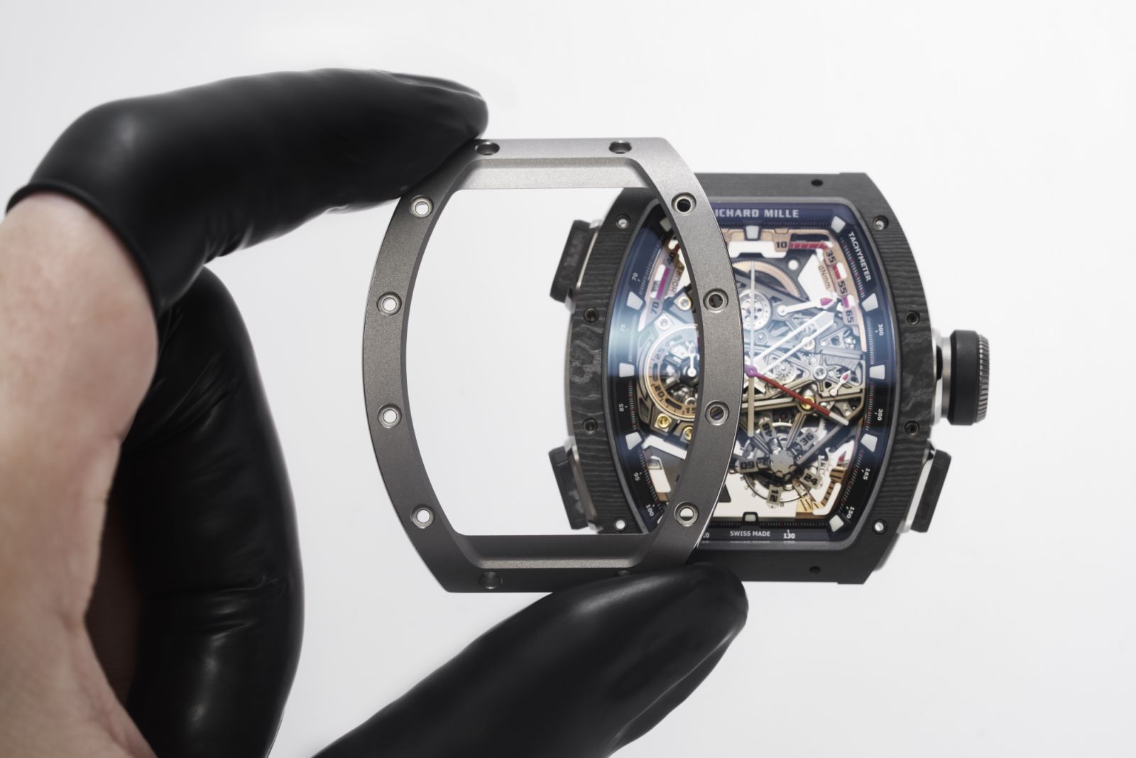 A close-up comparison of the polished grade 5 titanium with a carbon TPT and the full Carbon TPT