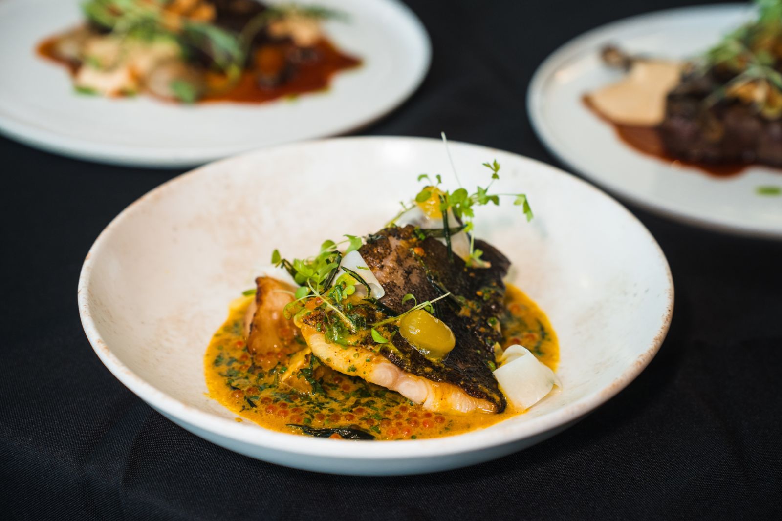 Alaskan black cod, celeriac, passionfruit gel, madras curry tarragon beurre blanc and ikura