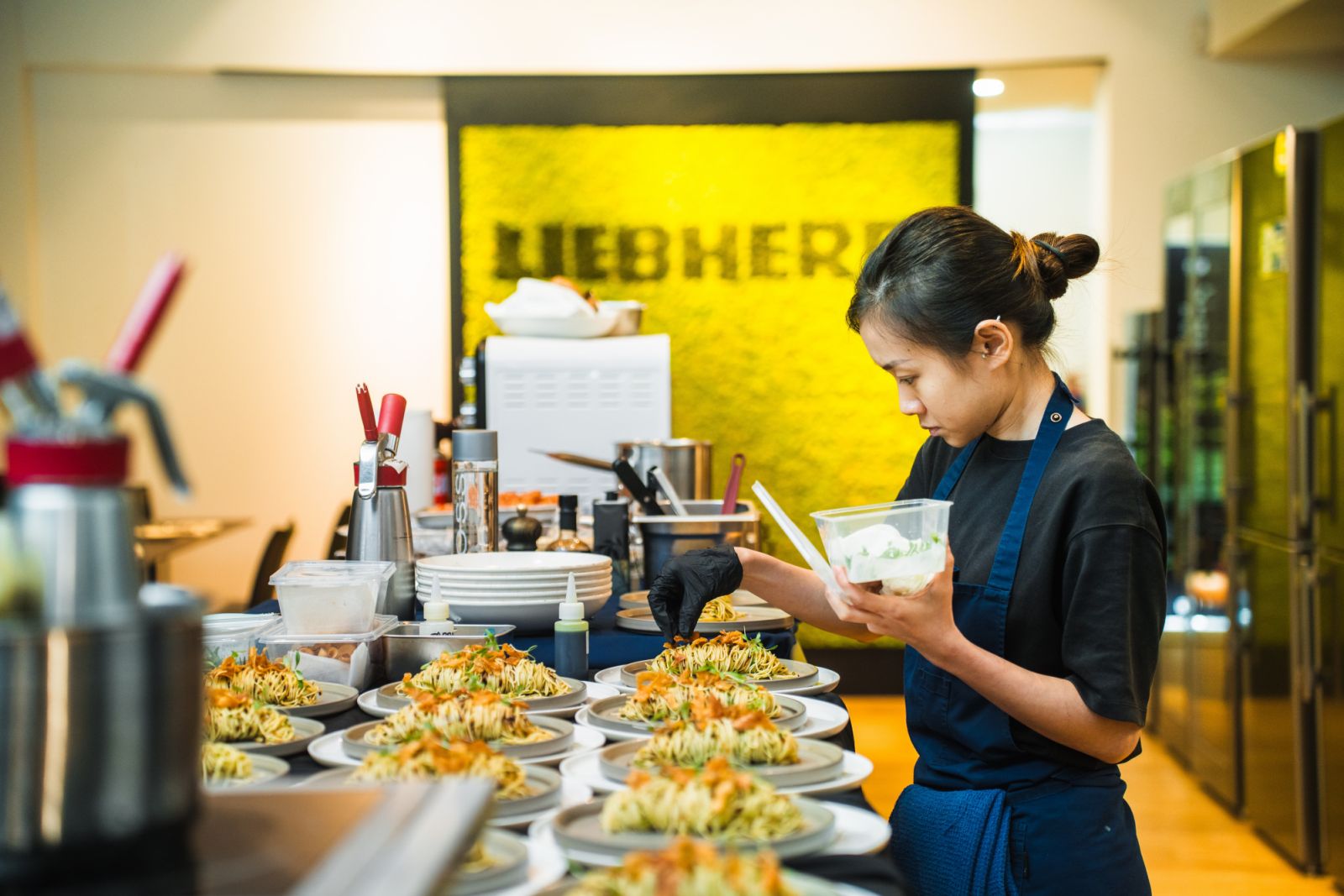 The Chef's Table team preparing the course
