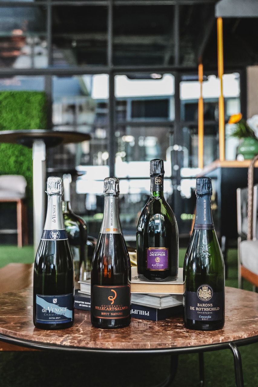 Chaotic wine pairings for Gemini season - Champagne from Cork