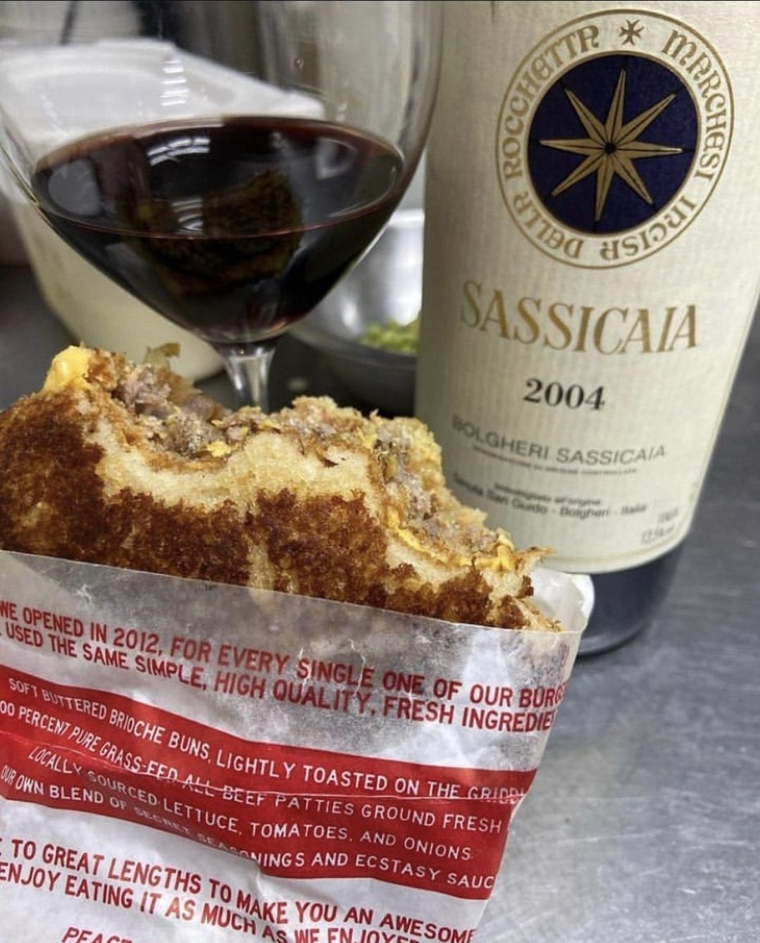 Chaotic wine pairings for Gemini season - Sweet ecstasy burger and Sassicaia