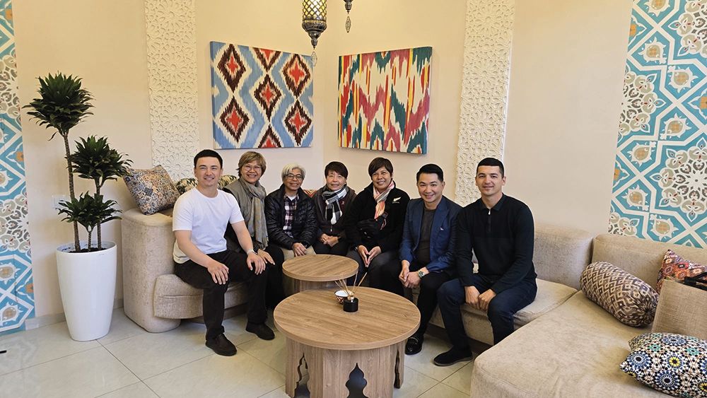 Go with his team and guests from Singapore