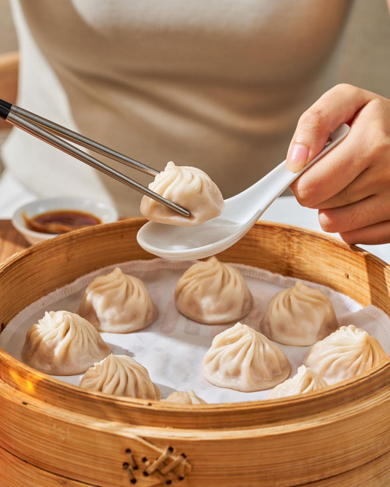Chaotic wine pairings for Gemini season - Din Tai Fung pork xiao long bao Facebook / @dintaifungph